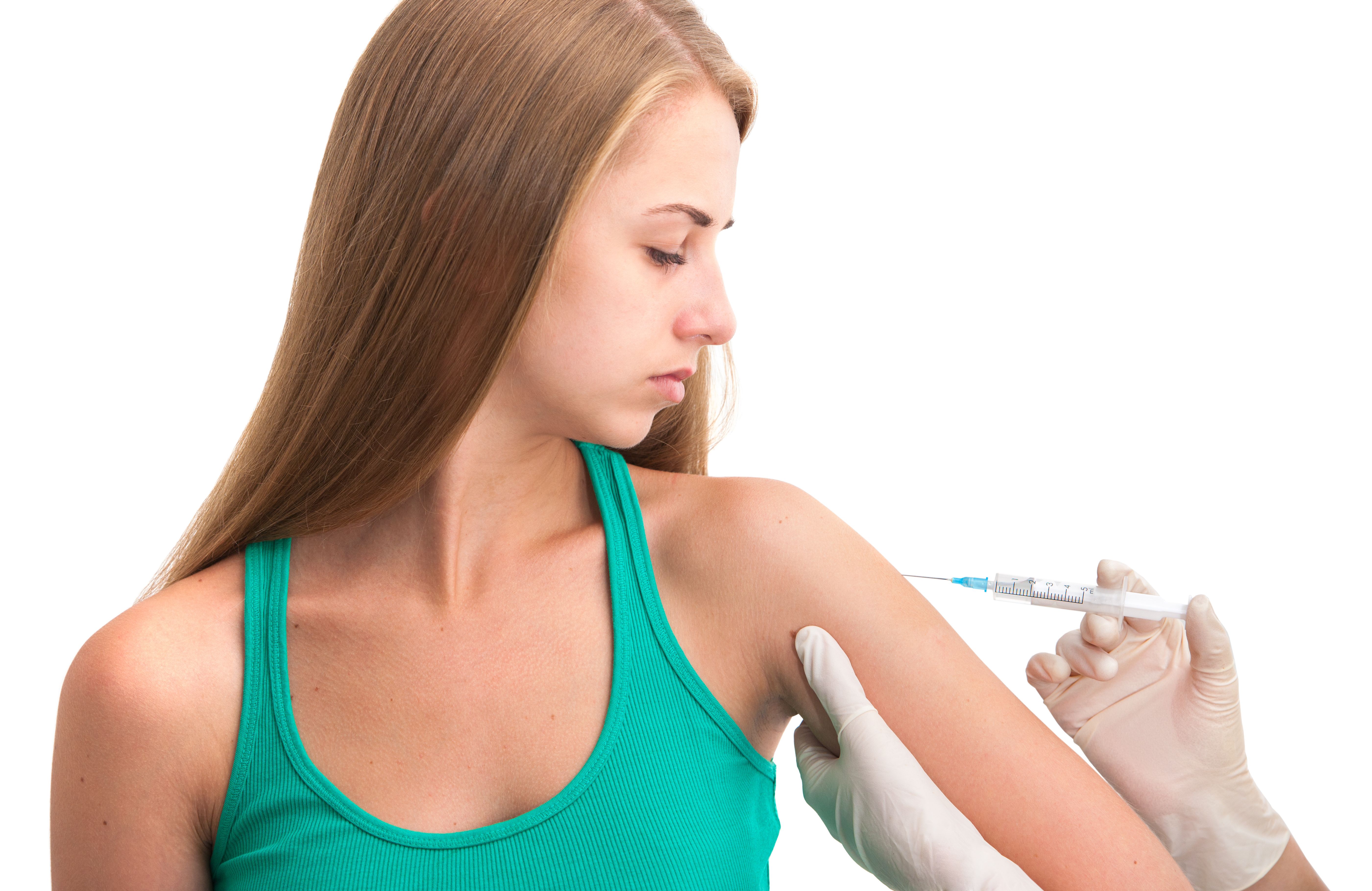 Young woman receiving flu shots