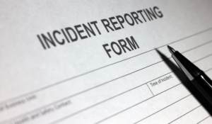 A photo of an incident reporting form
