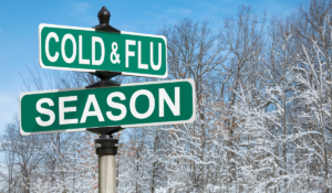 Street signs which read Cold & flu season, respiratory illnesses which can affect your workplace